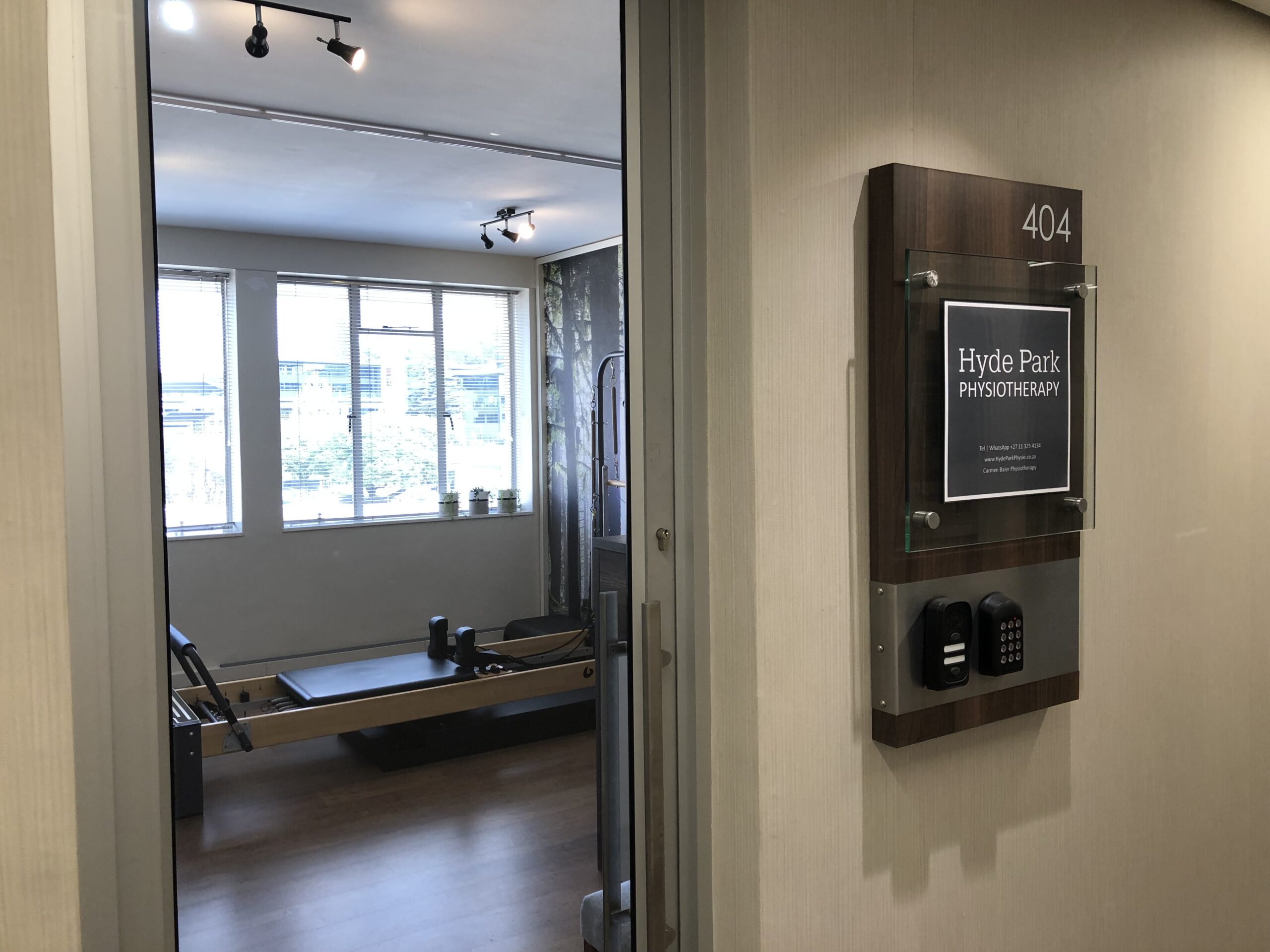 A photo showing the entrance to Hyde Park Physiotherapy at Suite 404, 4th Floor, South Wing, Office Towers, Hyde Park Corner Shopping Centre, 6th Road, Hyde Park, 2196