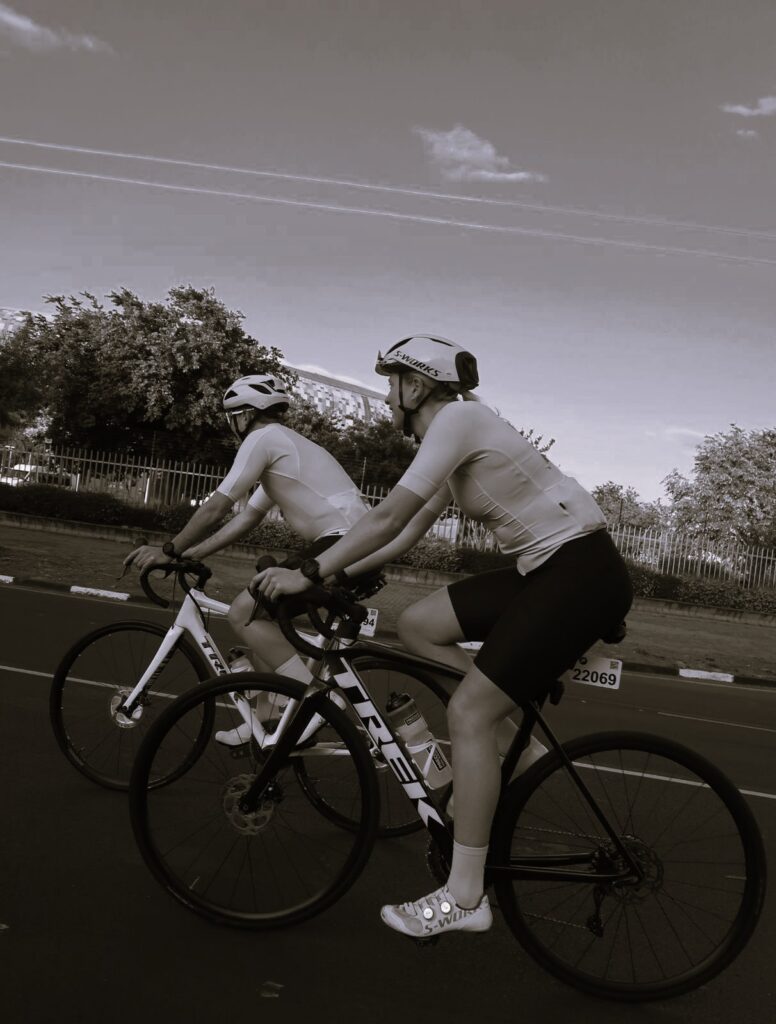 Sarah cycling with here triathlon club, back to triathlon training after successful rehab for ITB.